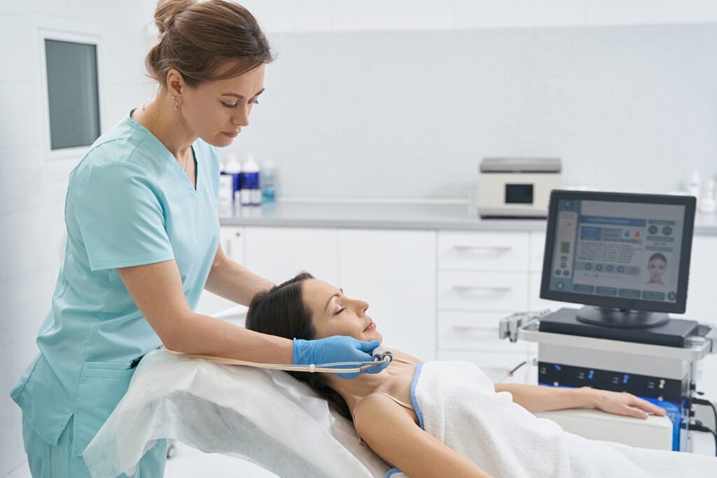 Woman getting a skincare treatment at a clinic.